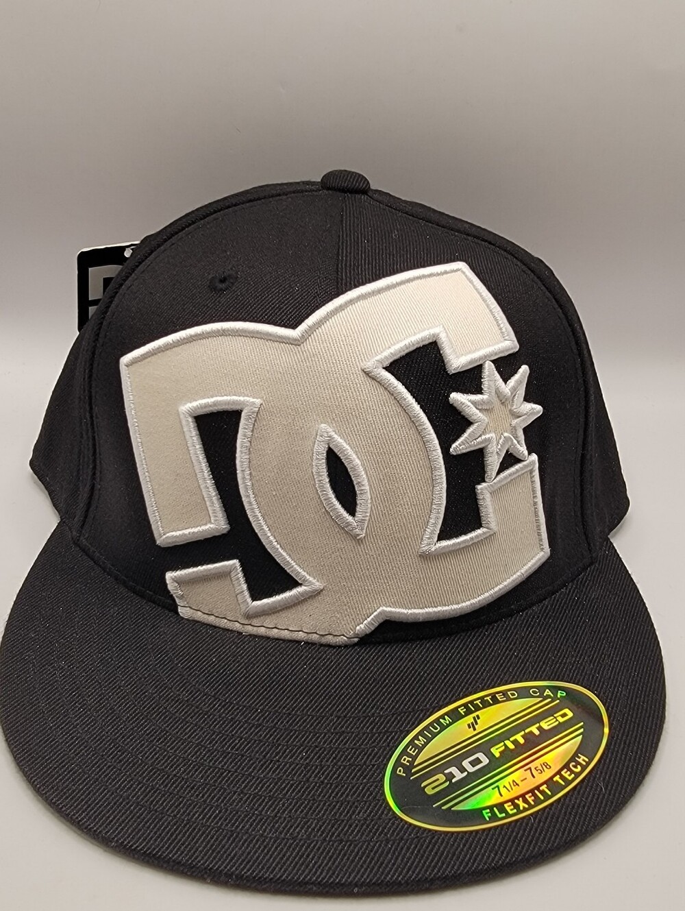 DC Black and Cream Logo Flexfit Hat